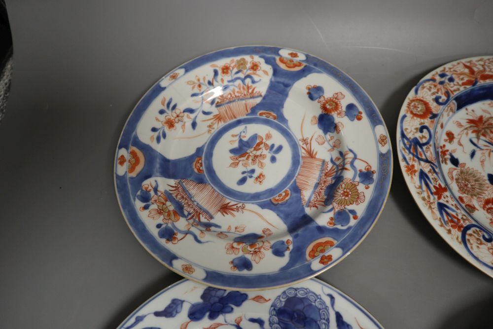 Four 18th century Chinese Imari dishes, 22.5cm, painted underglaze in typical palette